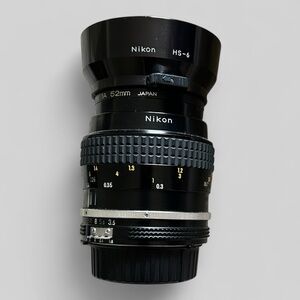 Nikon Micro-NIKKOR 55mm f/3.5 lens & bonus Kenko 1A 52mm filter.